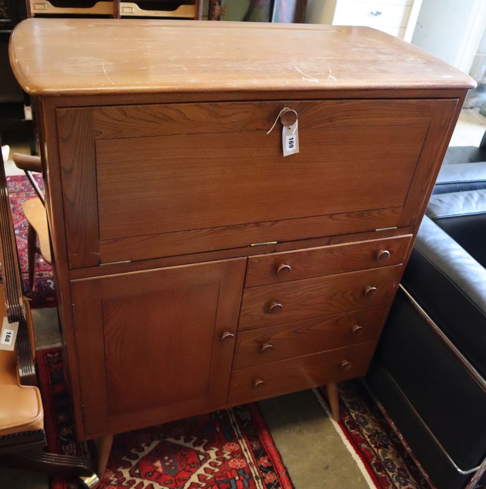 An Ercol cocktail cabinet, width 98cm, depth 46cm, height 150cm